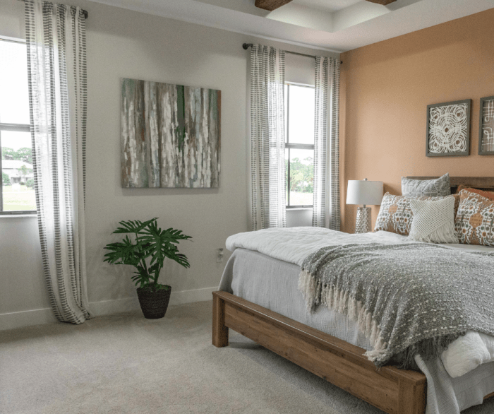 How to decorate a bedroom with two windows